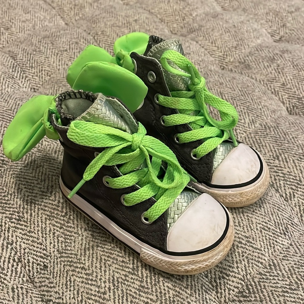 Converse high tops with bows size 4